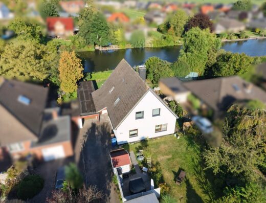 Vermietetes Zweifamilienhaus direkt am Wasser in Berne!