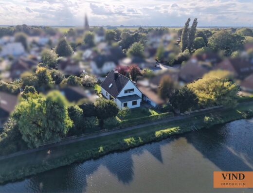 Vermietetes Zweifamilienhaus direkt am Wasser in Berne!